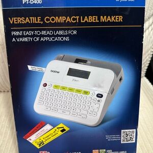Brother P-Touch Label Maker PT-D400 -NEW in Box - Comes with a clear cartridge.